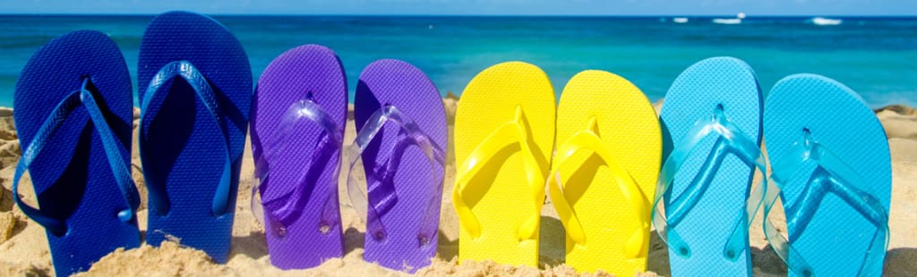 Things To Do on Maui in Summer: slippers on the beach