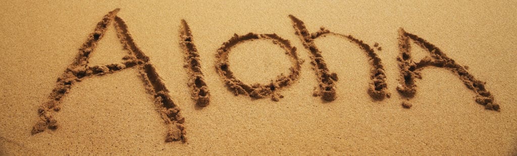 Hawaiian words: the word "aloha" in the sand