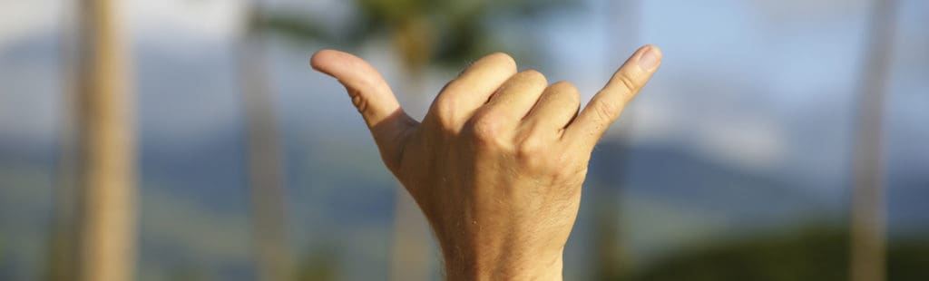 travel tips for Maui visitors: shaka sign