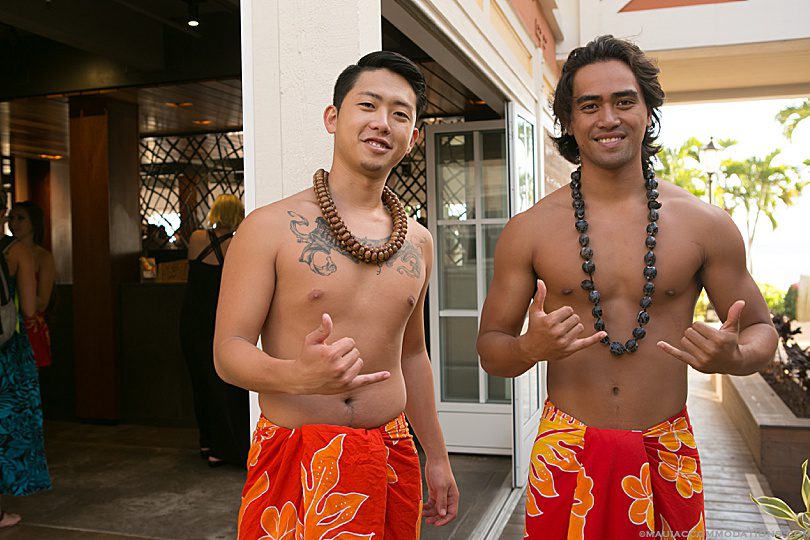 Throwing shaka at a luau, Maui